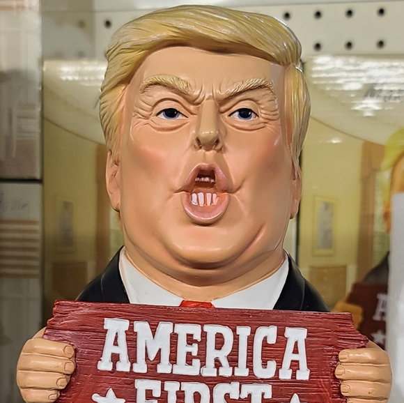 Donald Trump Holding "America First" Sign - Picture 2 of 5